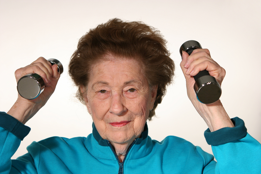 Image: Elderly woman lifting weights